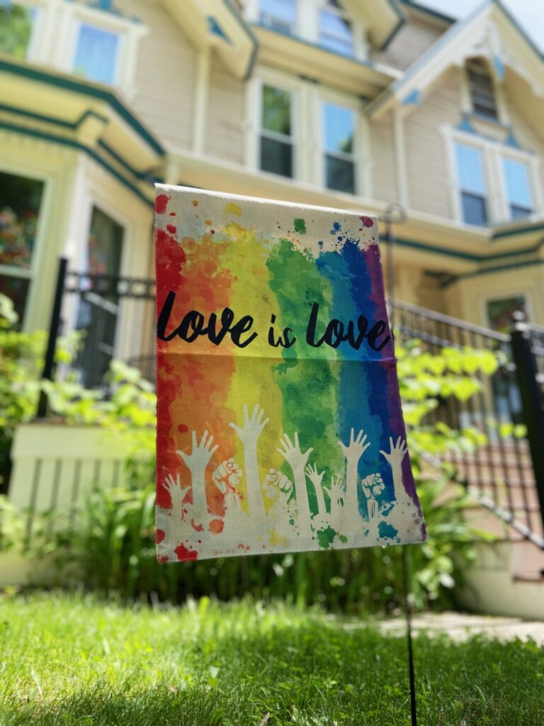 Rainbow love is love sign