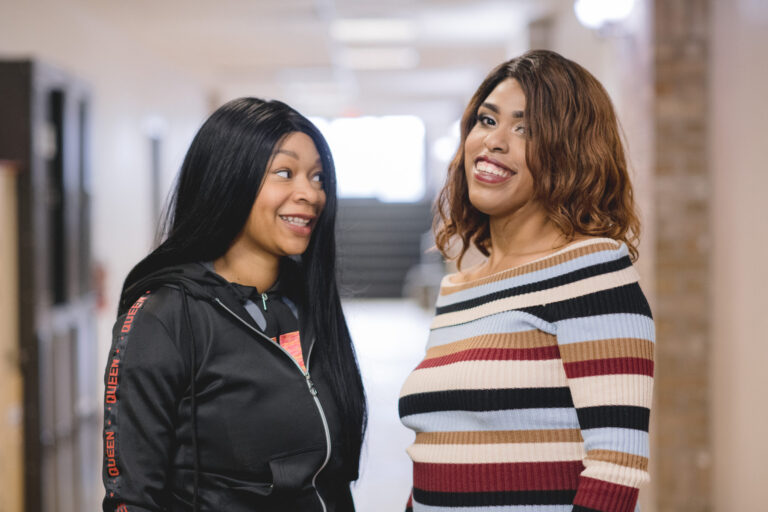 Two women smiling